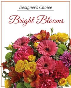 Designer&rsquo;s Choice Bright Blooms arranged in a vase
